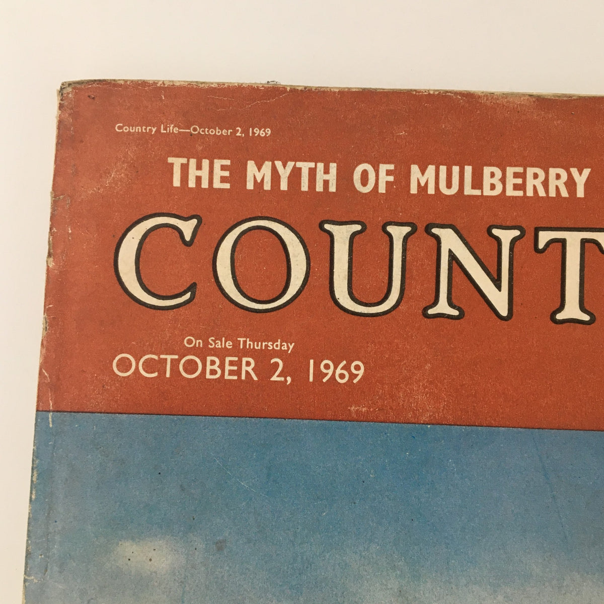 Cover of VTG Country Life Magazine from October 2, 1969, featuring the article 'The Myth of Mulberry Burn Veneer,' with a colorful design showcasing the date and magazine title.