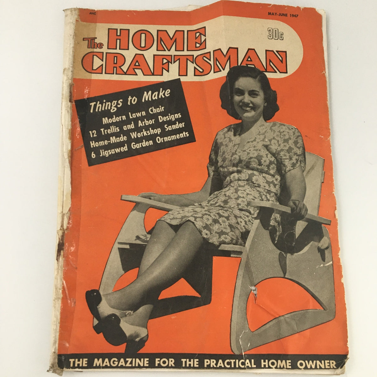 Cover of VTG The Home Craftsman Magazine May June 1947 featuring a woman sitting on a modern lawn chair, showcasing home craftsmanship and DIY tips.
