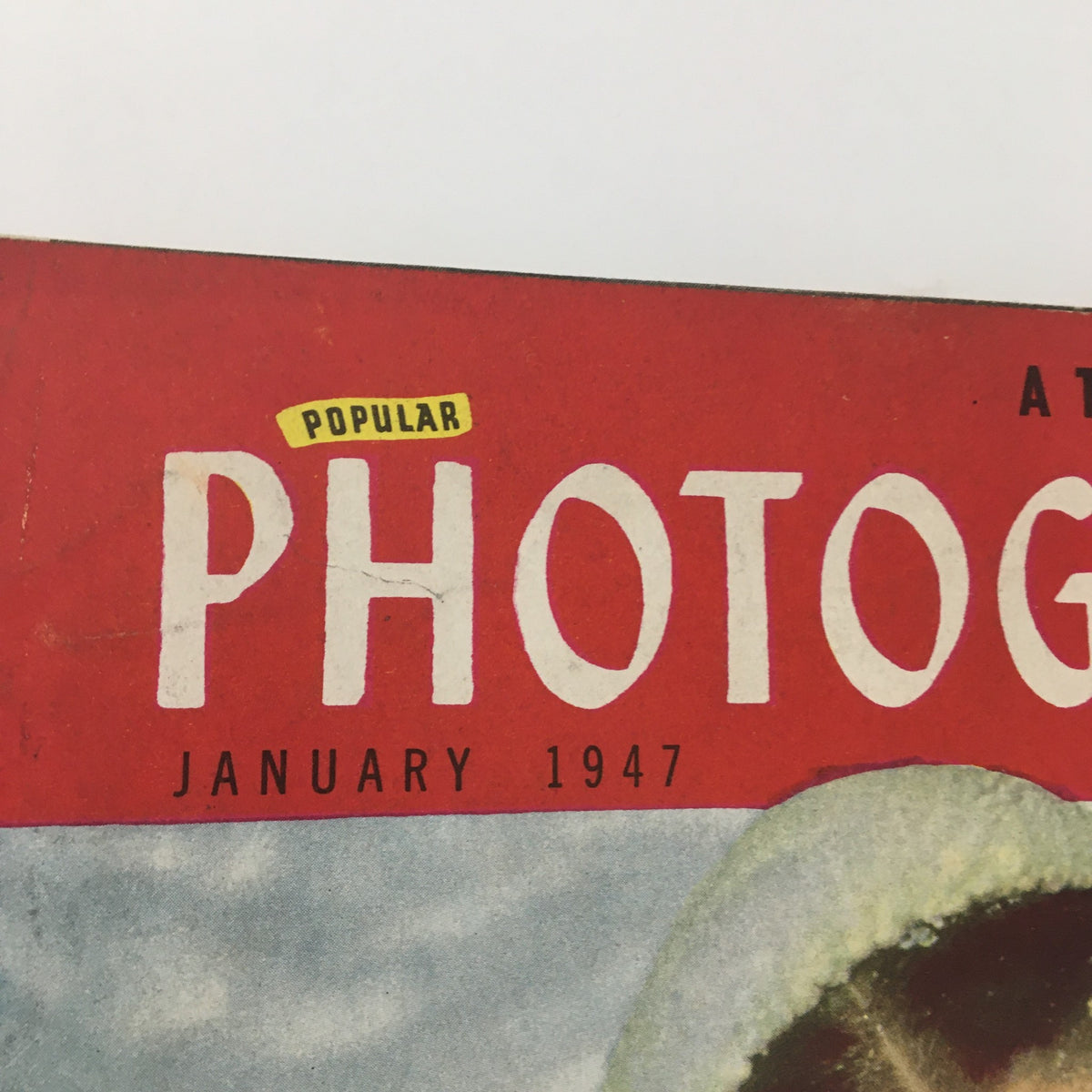 Close-up of the title on the cover of VTG Popular Photography Magazine January 1947, showcasing the title 'Popular Photography' and the issue published in January 1947.
