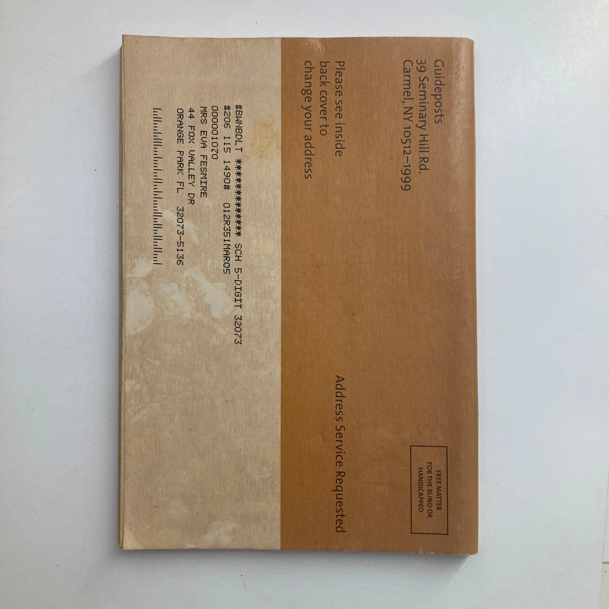 Back cover of Guideposts Magazine March 2004 featuring a mailing address and instructions for change of address, showcasing the vintage design and details associated with collectibles.