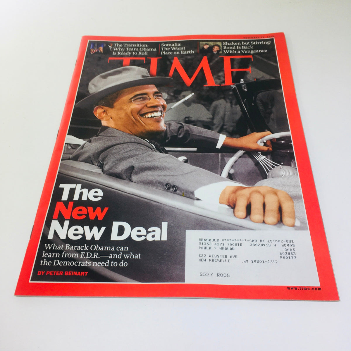 Time Magazine cover dated November 24, 2008, featuring the title 'The New, New Deal' with an image of Barack Obama smiling from a vintage car. This issue discusses Obama's election and its historical significance.