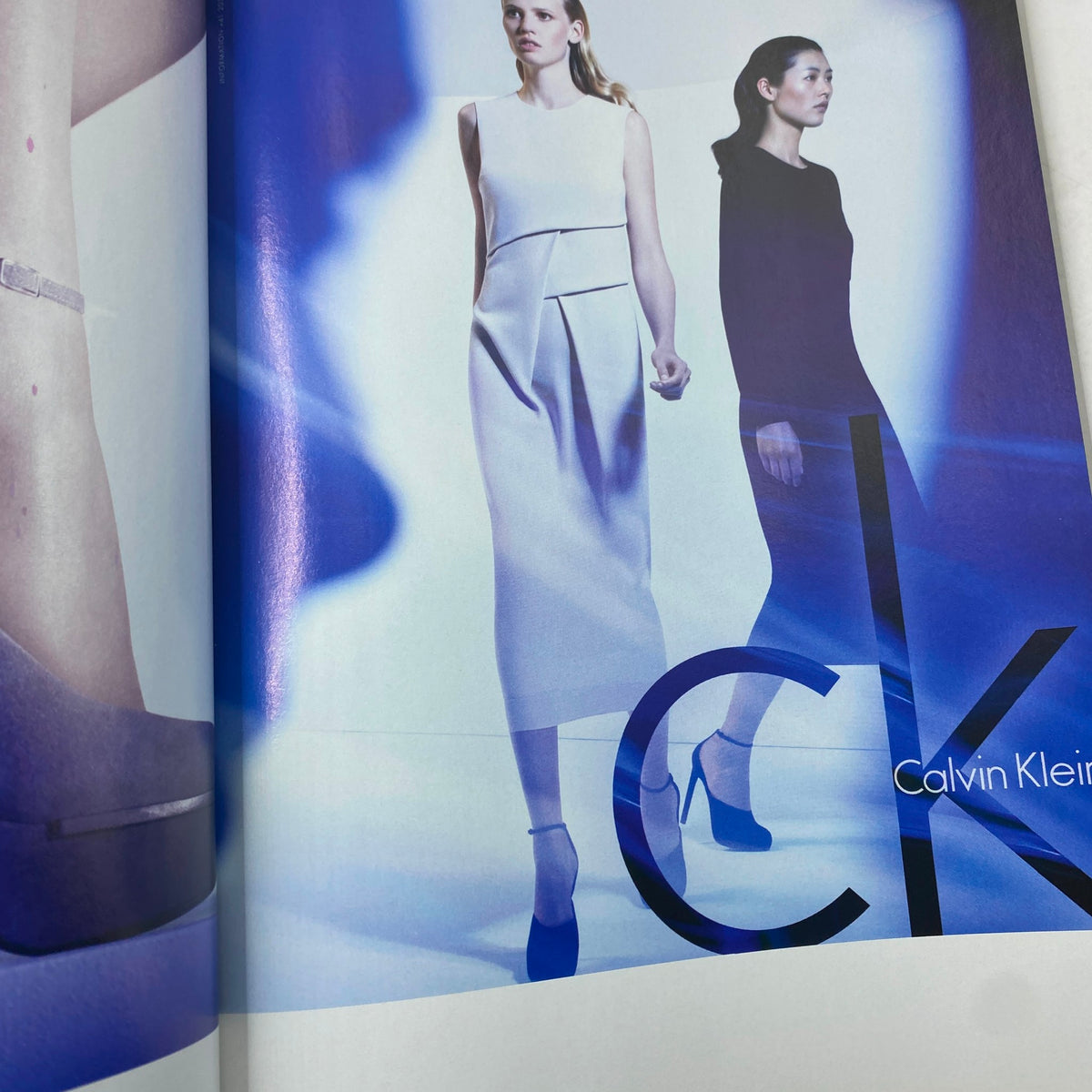 Fashion spread from Harper's Bazaar UK Magazine September 2011 featuring models in designs by Calvin Klein, emphasizing contemporary fashion styles.