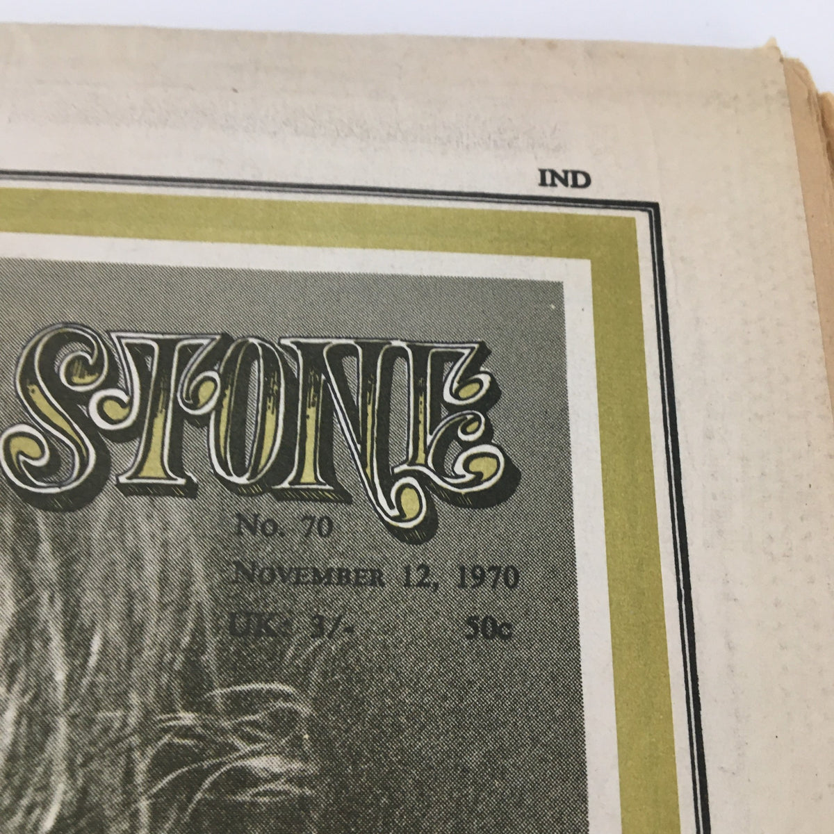 Close-up of the top section of the Rolling Stone Magazine from November 12, 1970, featuring the title and issue number, integral for collectors of vintage magazines like Grace Slick cover feature.