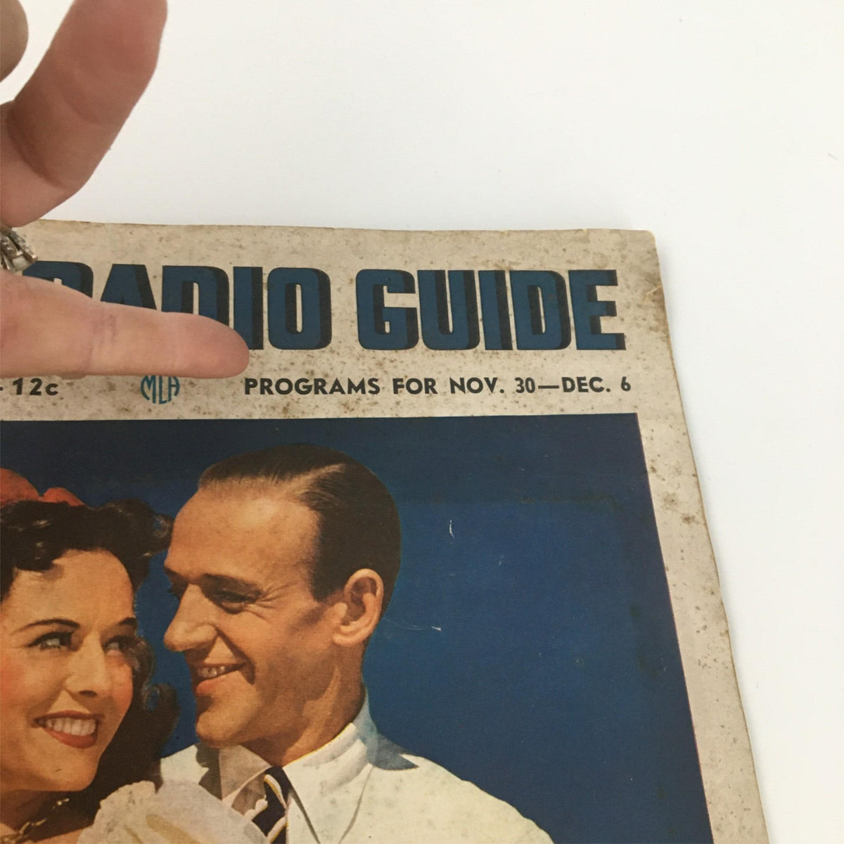 VTG Movie Radio Guide Programs November December 1938 Fred Astaire Cover close-up details of the magazine cover, highlighting the iconic title and imagery of Fred Astaire with a smiling expression.