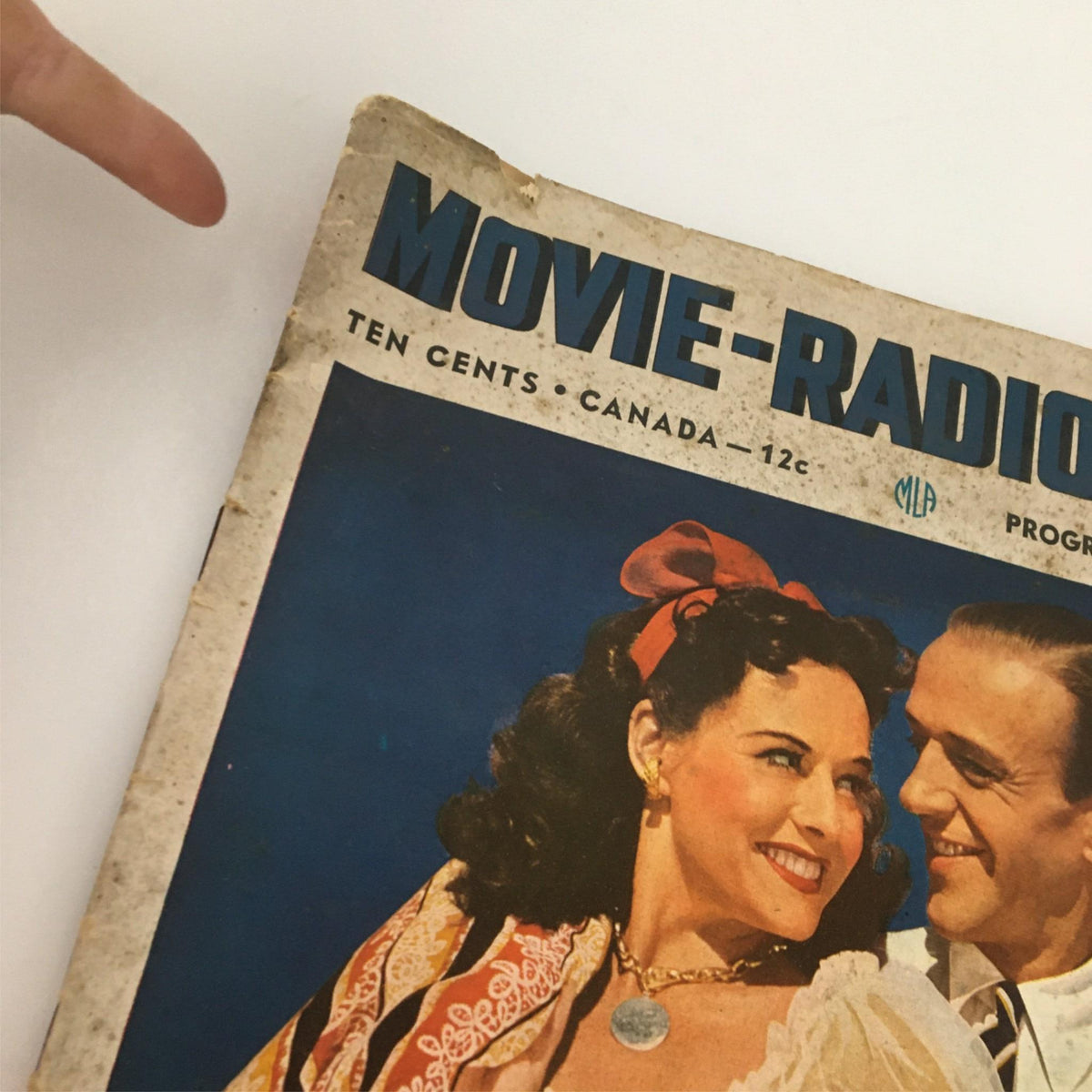 Close-up view of the cover of the VTG Movie Radio Guide Programs for November December 1938 featuring vibrant colors and vintage design, highlighting the iconic Fred Astaire. Perfect addition for collectors and vintage film enthusiasts.