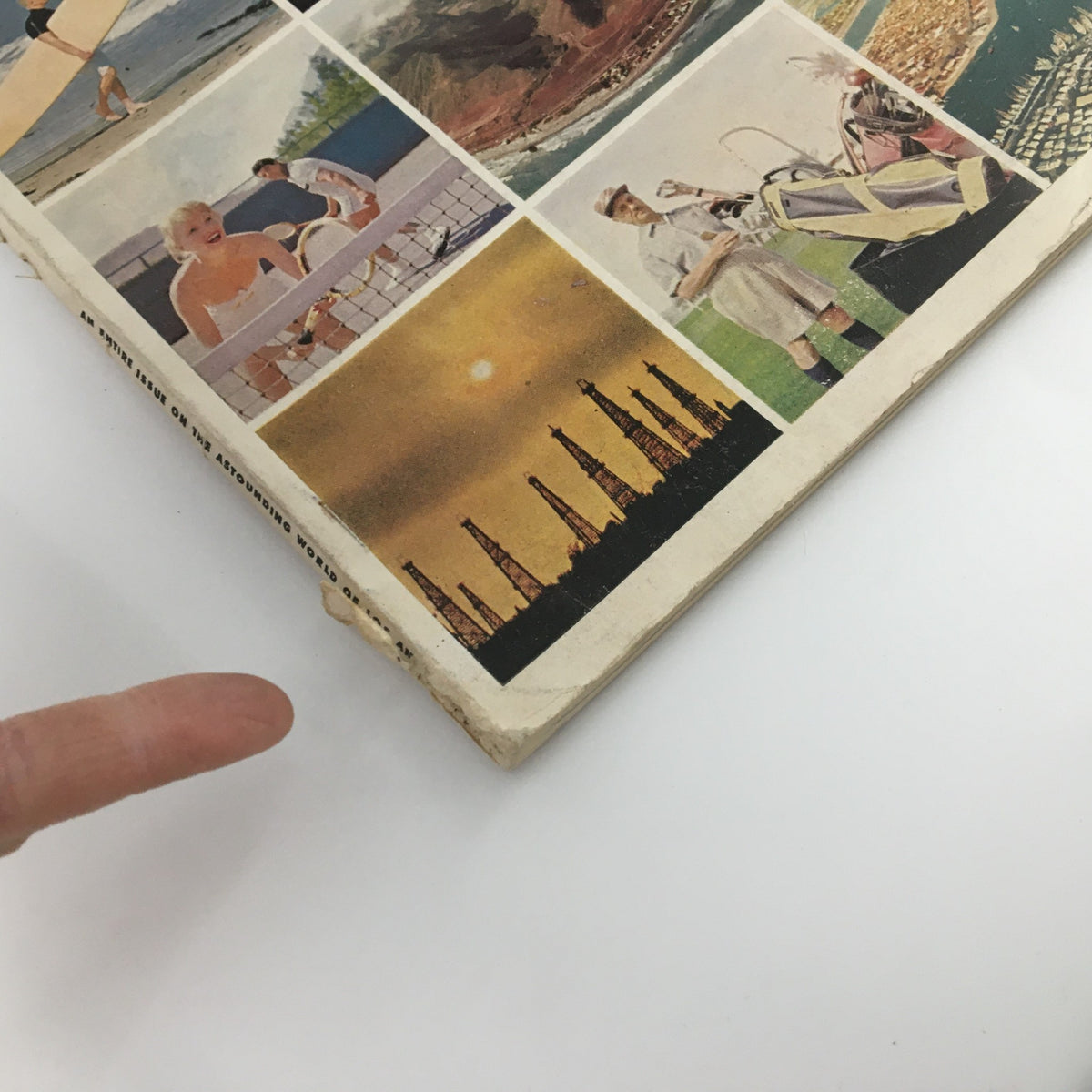 Side view of VTG Holiday Magazine October 1957 highlighting the worn edges and vibrant images related to Los Angeles.