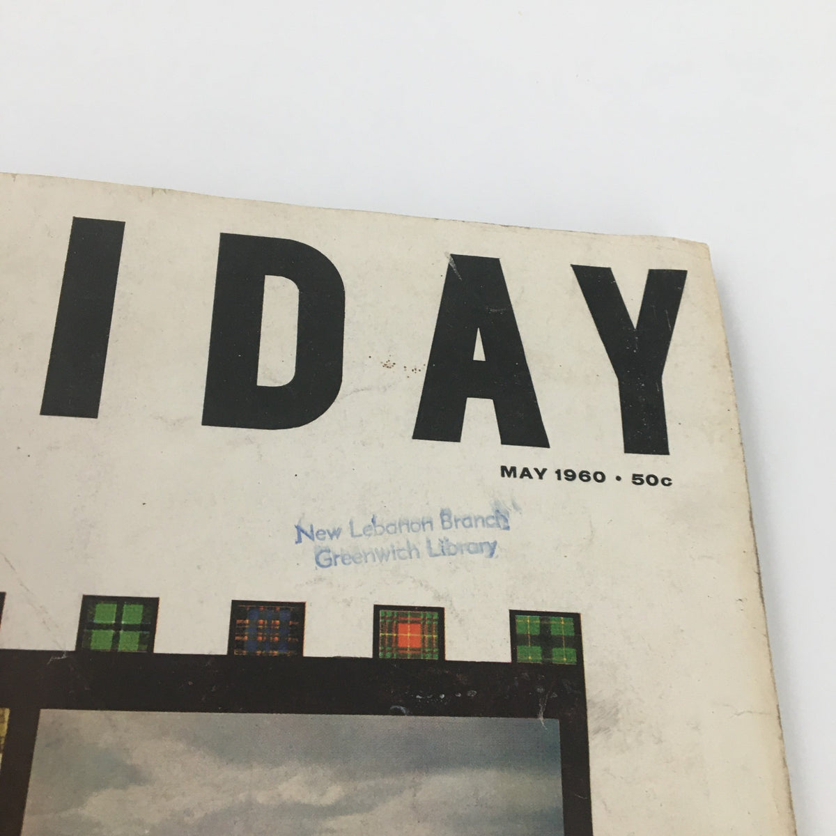 Detailed view of the VTG Holiday Magazine May 1960 title area, with a library stamp visible, reflecting its collectible status and historic context related to Scotland.