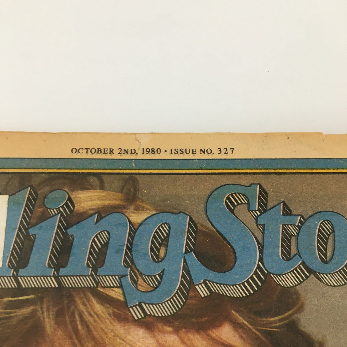 Close-up of the top of VTG Rolling Stone Magazine October 2 1980 Issue #327, displaying the publication date and title prominently.
