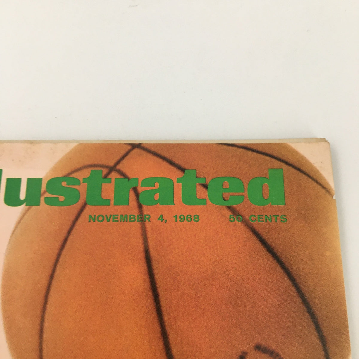 Close-up of the title and date on the Sports Illustrated Magazine, November 4, 1968, featuring a basketball image, highlighting its vintage appeal.