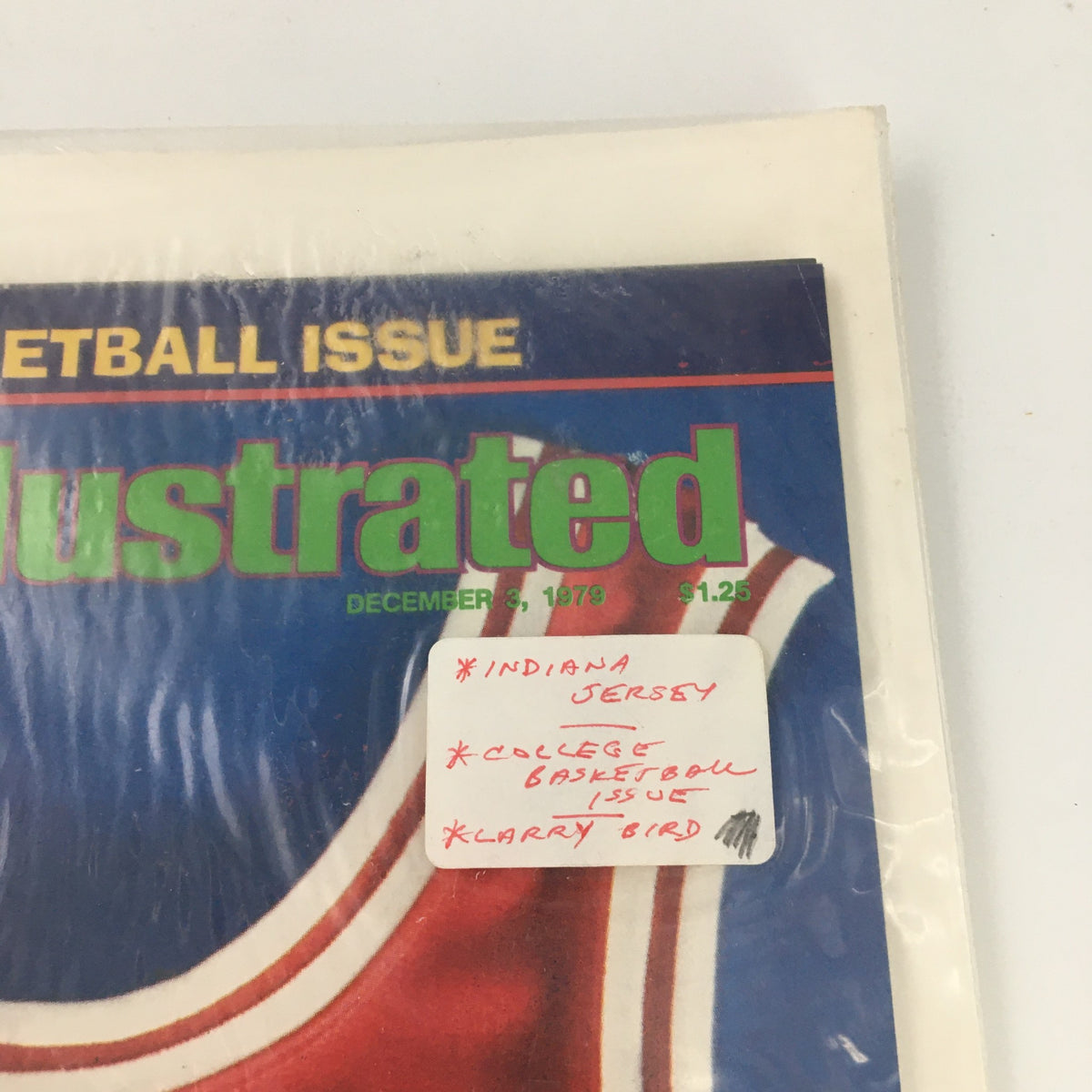 Detailed view of the VTG Sports Illustrated Magazine December 3 1979 cover, showcasing labels mentioning 'Indiana Jersey', 'College Basketball Issue', and 'Larry Bird'.