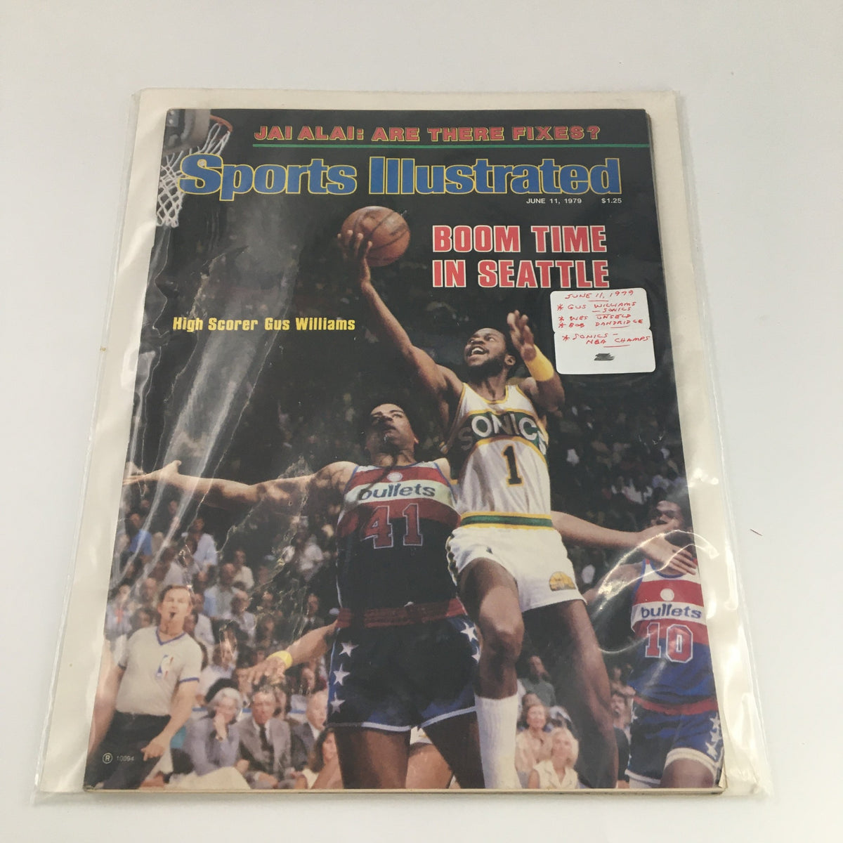 VTG Sports Illustrated Magazine June 11, 1979 protected in plastic sleeve, showcasing cover with Gus Williams during a crucial basketball moment.
