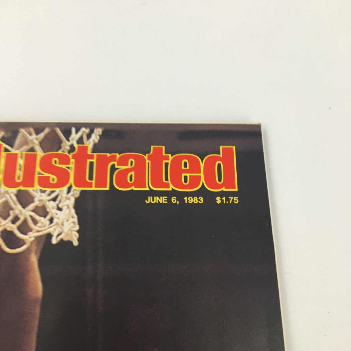 Close-up of the vintage Sports Illustrated magazine cover from June 6, 1983, featuring the logo and publication date, showcasing the significance of sports history.