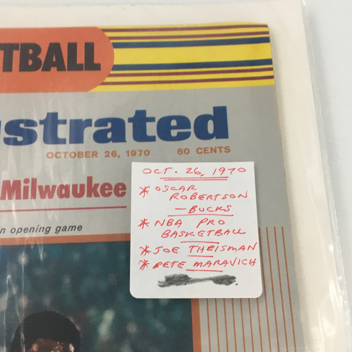 Close-up of the front cover of Vintage Sports Illustrated Magazine October 26 1970 featuring Oscar Robertson, with detailed handwritten notes.