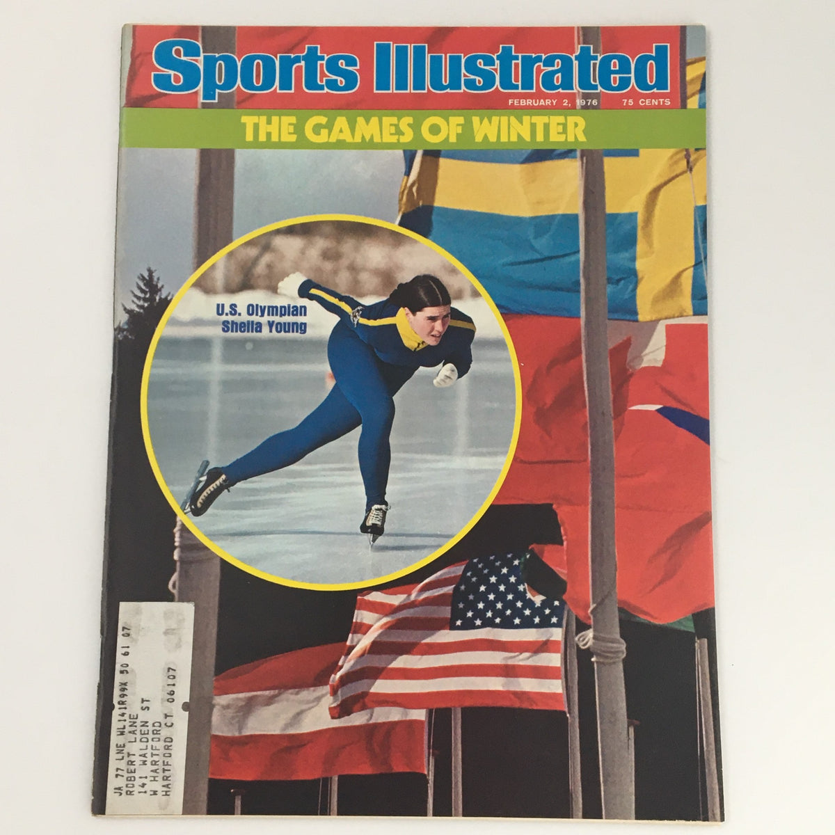 Vintage Sports Illustrated Magazine Cover from February 2, 1976 featuring U.S. Olympian Sheila Young in action, surrounded by international flags.