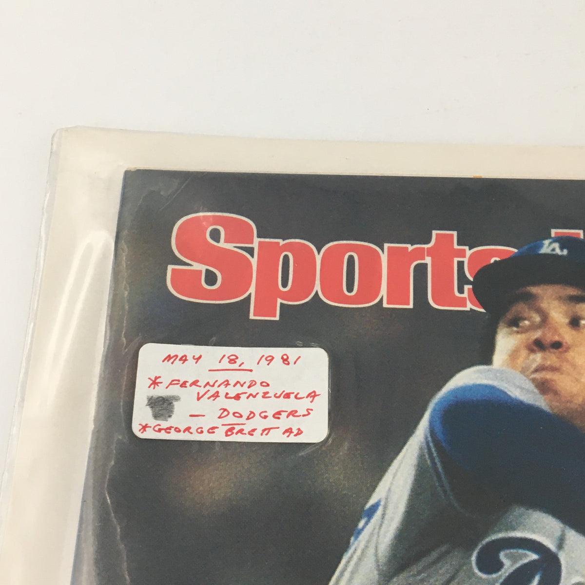 Detailed shot of Sports Illustrated Magazine May 18 1981 cover with a sticker indicating Fernando Valenzuela and the Dodgers, emphasizing the magazine's collector's value.