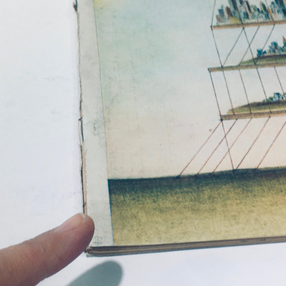 Detail close-up of the edge of The New Yorker magazine from June 9, 1975, showcasing the vintage cover art by Paul Degen, revealing its well-preserved condition and minimal wear, making it an ideal collector's item.