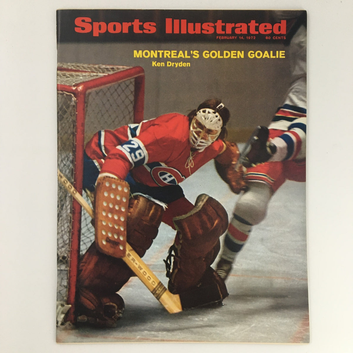 Sports Illustrated magazine cover from February 14, 1972, featuring Ken Dryden, the Montreal Canadiens goalie, showcasing his iconic number 29 while making a dynamic save.
