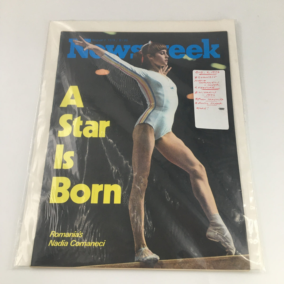 Protective sleeve covering the VTG Newsweek Magazine August 2 1976 with Romania's Nadia Comaneci on the cover, labeled with key highlights including gymnast feature and Olympic mention.