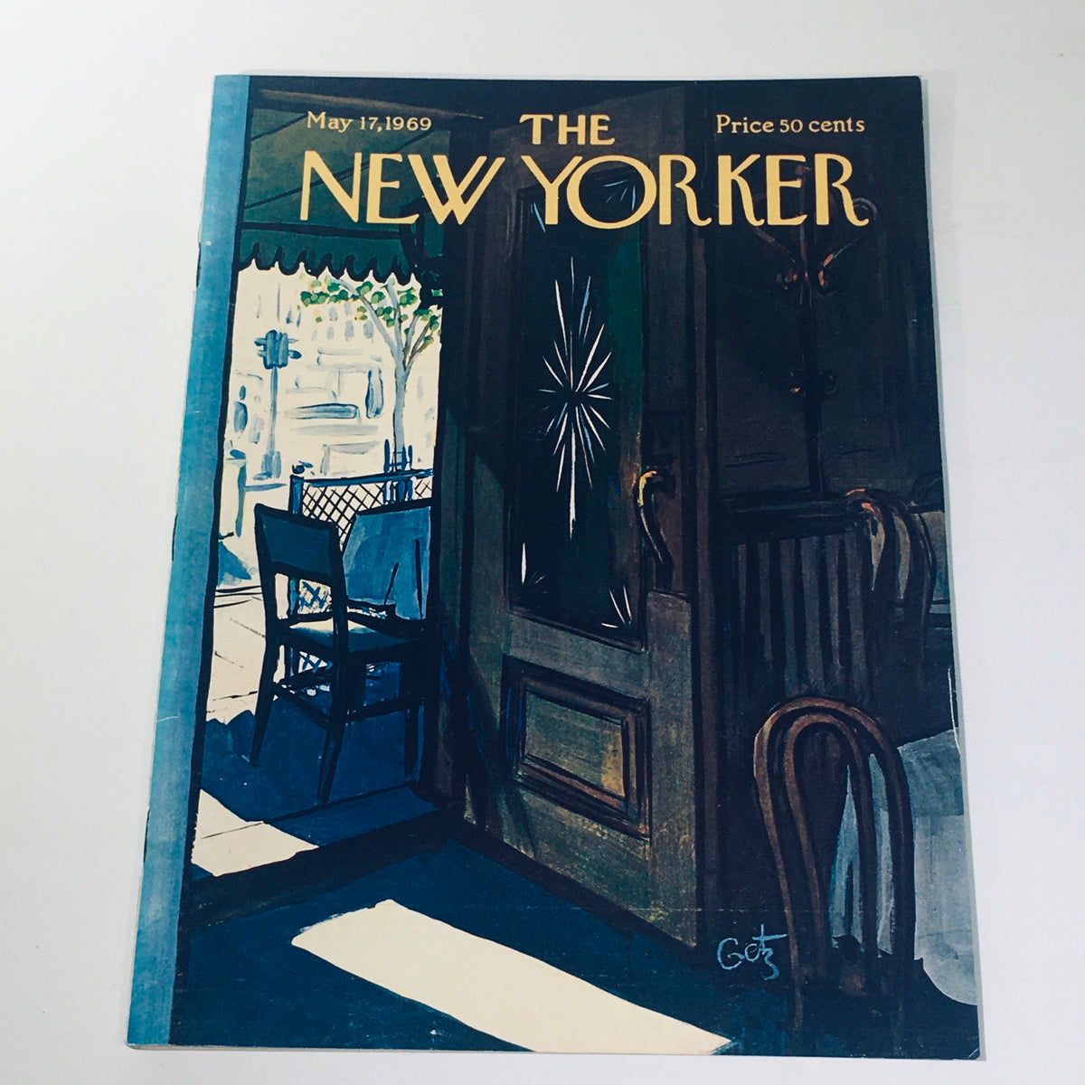Cover of The New Yorker magazine from May 17, 1969, featuring artwork by Arthur Getz, showcasing an inviting urban scene with a chair and open door.