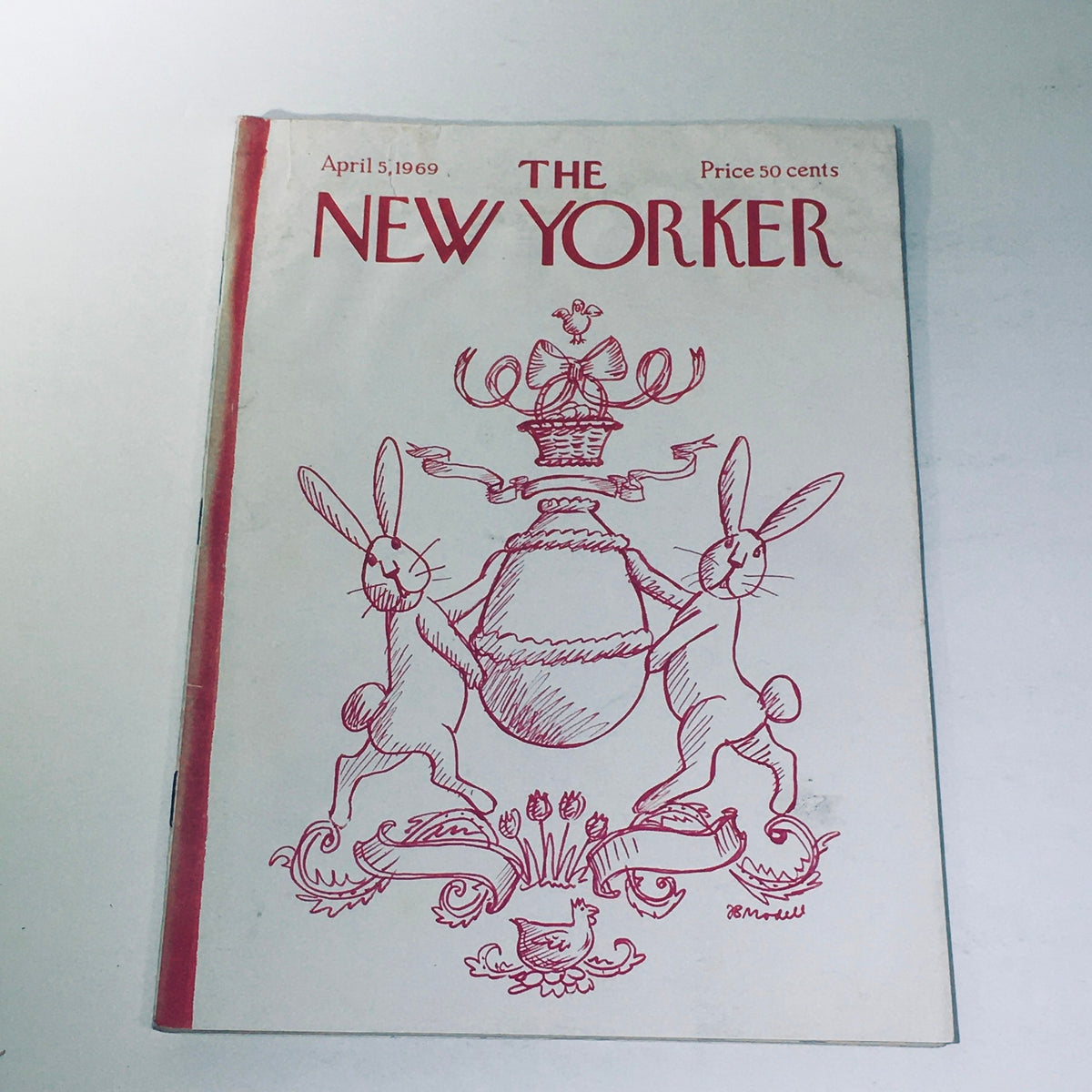 The New Yorker Magazine April 5 1969 featuring a whimsical Easter Bunny illustration by Frank Modell, showcasing two bunnies holding an ornate basket, perfect for collectors and vintage art enthusiasts.