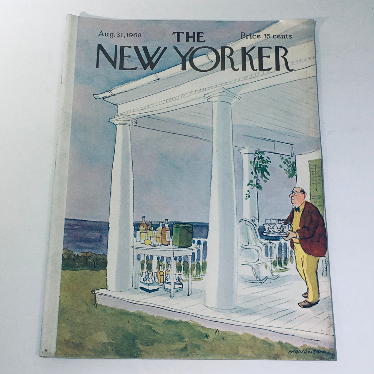The New Yorker magazine cover from August 31, 1968 featuring artwork by James Stevenson, showcasing a serene porch scene with a man serving drinks, set against a coastal backdrop.