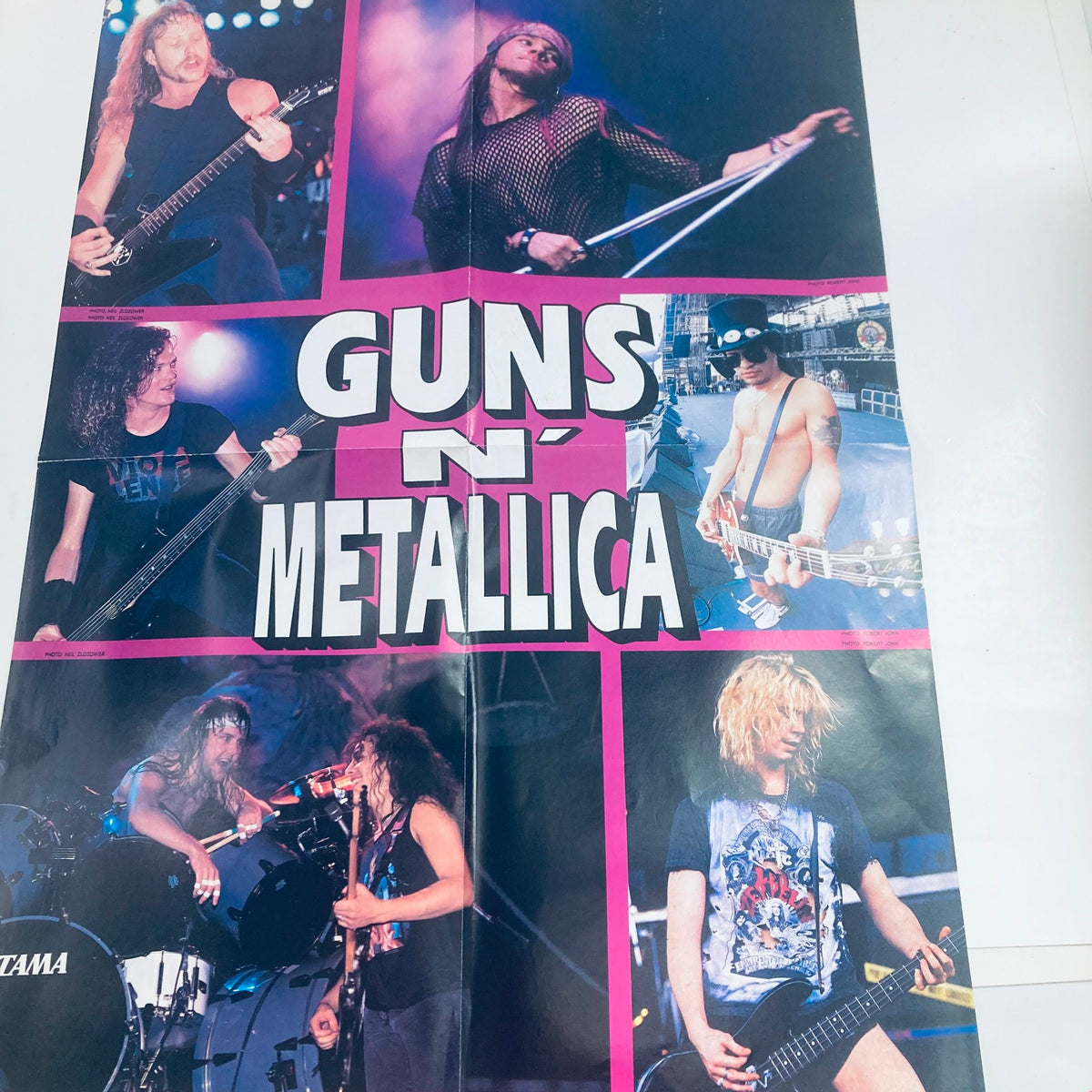 Poster from Hit Parader Magazine September 1992 showcasing Guns N' Roses and Metallica, highlighting the iconic rock bands with vibrant visuals.