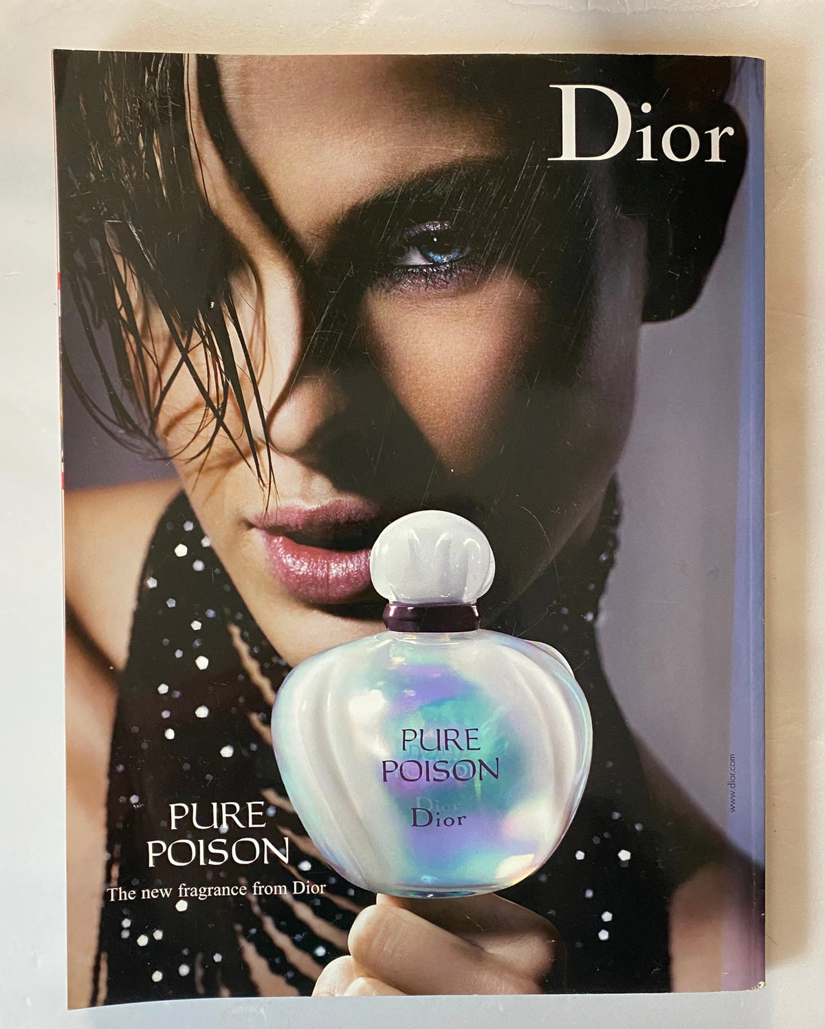 Dior advertisement in Harpers & Queen British Edition Magazine October 2005 promoting Pure Poison, a new fragrance featuring a stylish model.