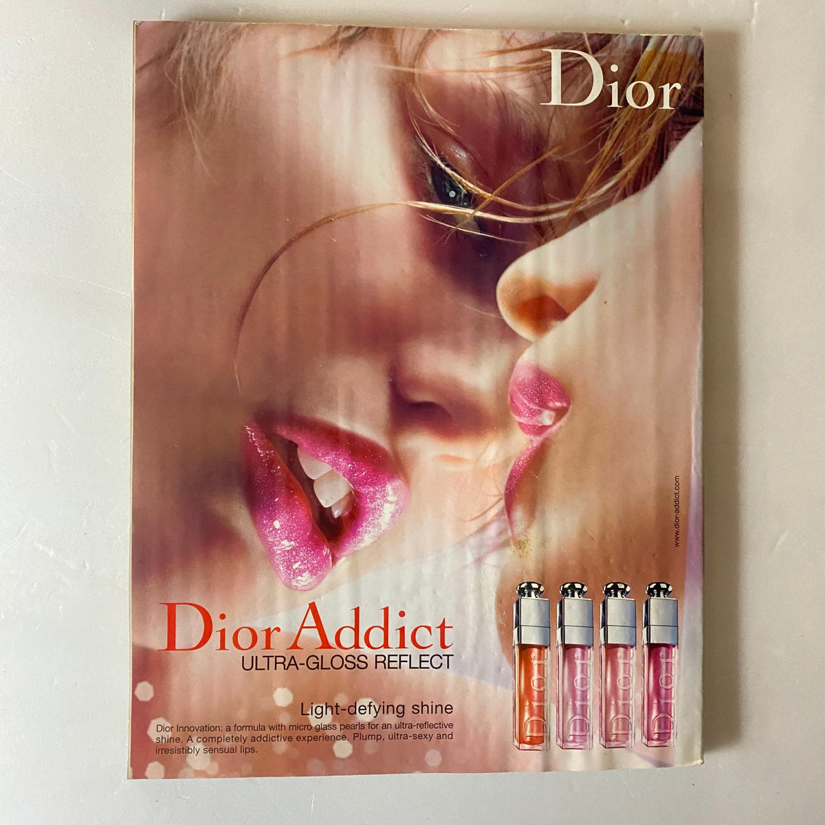Elle UK Magazine July 2007 Drew Barrymore Cover No Label displaying an advertisement for Dior's Ultra-Gloss Reflect lip product.