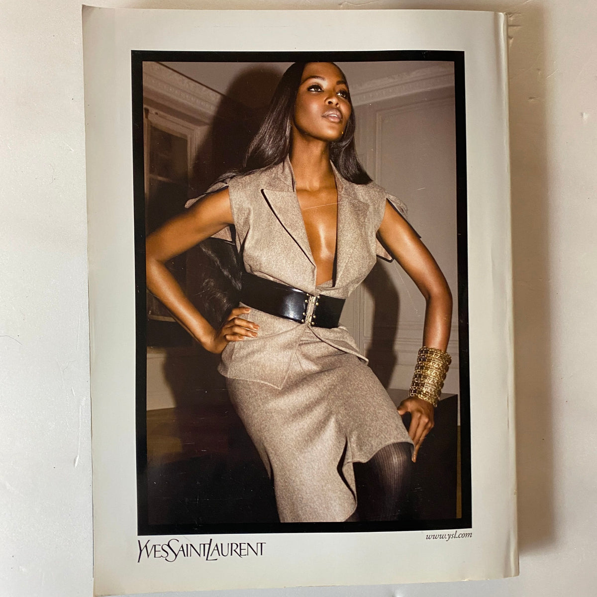 Stunning fashion photography from Harper's Bazaar September 2008 showcasing a model in a chic Yves Saint Laurent dress exuding elegance and style.