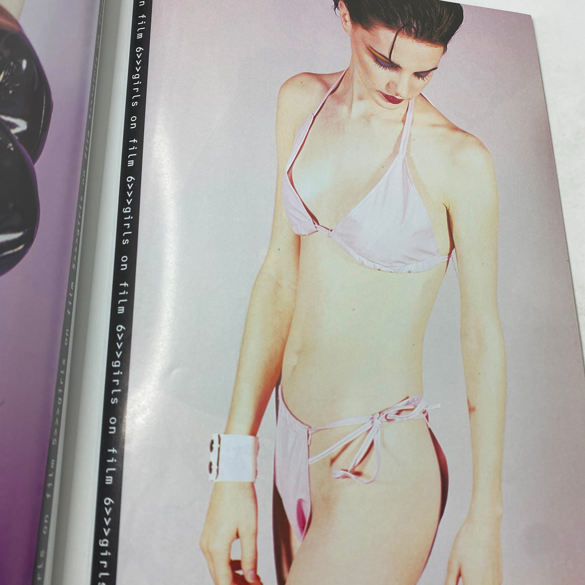 Fashion editorial image from Bleach Magazine June 1998, depicting a model in a stylish pink bikini, reflecting trends from the late 1990s.