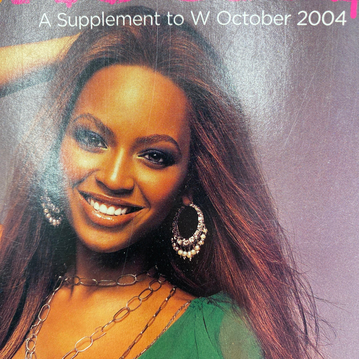 Beyoncé featured on the cover of the Fashion Rocks supplement to W Magazine, October 2004, showcasing her signature style and beauty.