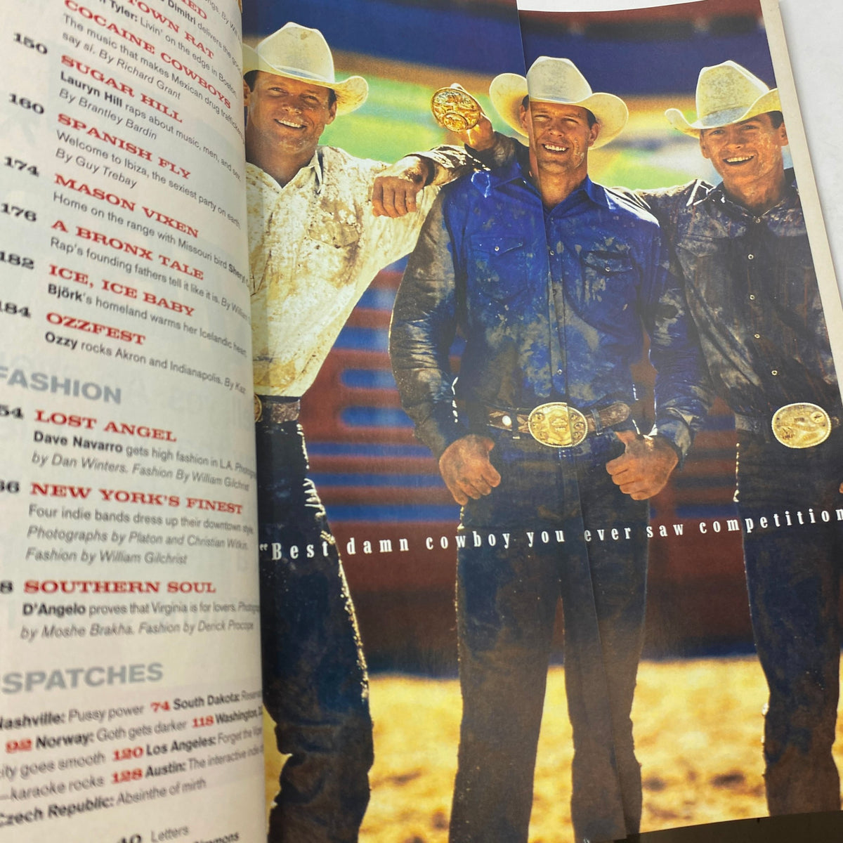 Inside spread of Details Magazine November 1998 showcasing three cowboys, celebrating western culture and fashion, indicating the diverse topics covered in this issue.