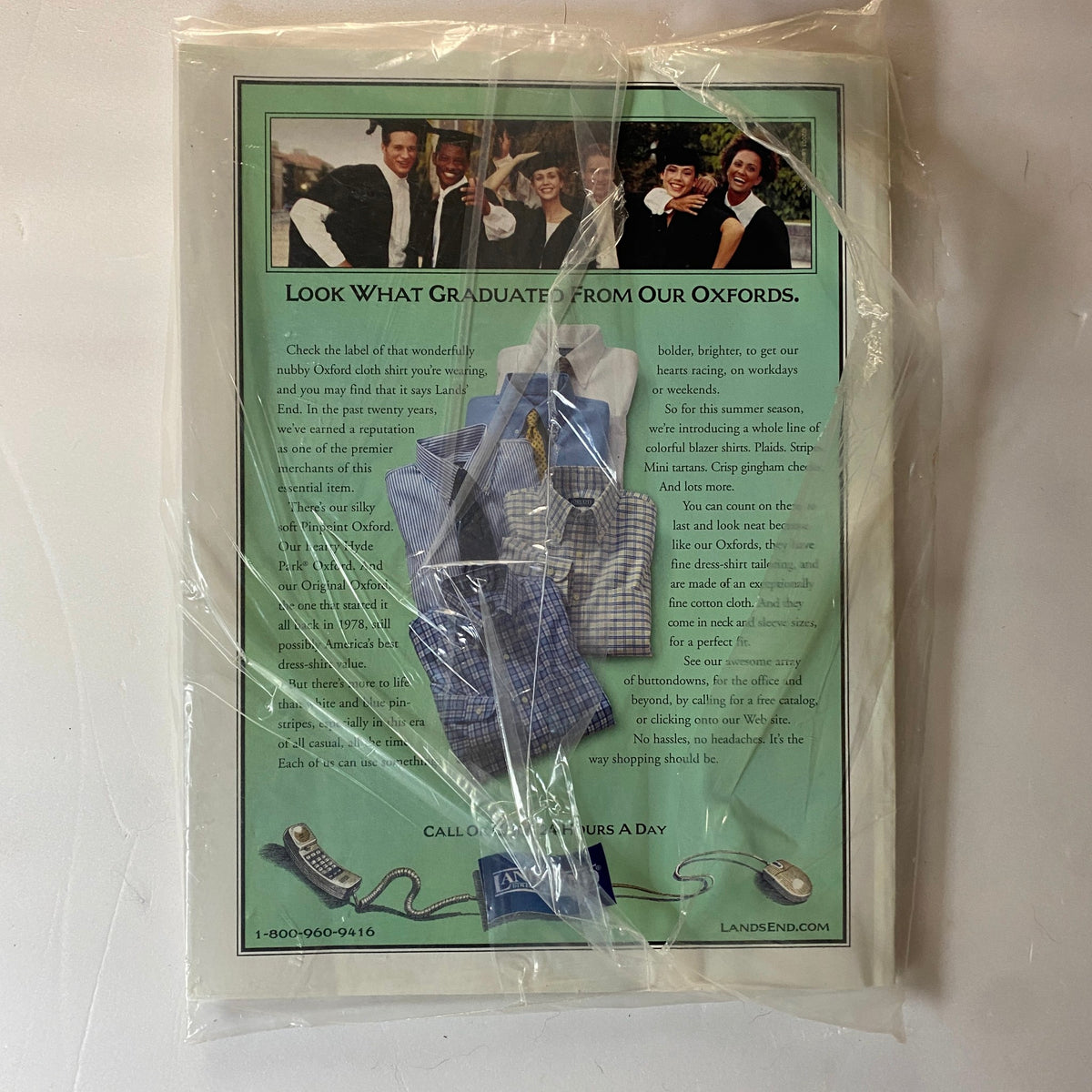 Back cover of the 2001 Oxford American 5th Annual Southern Music Issue showcasing a promotional advertisement with images of graduates wearing traditional Oxford clothing.