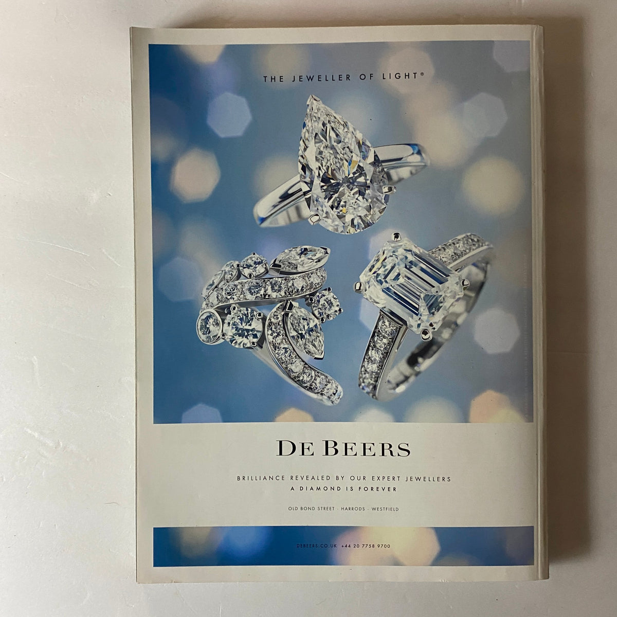 Advertisement page from Harper's Bazaar Magazine September 2013 featuring De Beers jewellery, showcasing elegant diamond pieces in the context of luxury fashion.