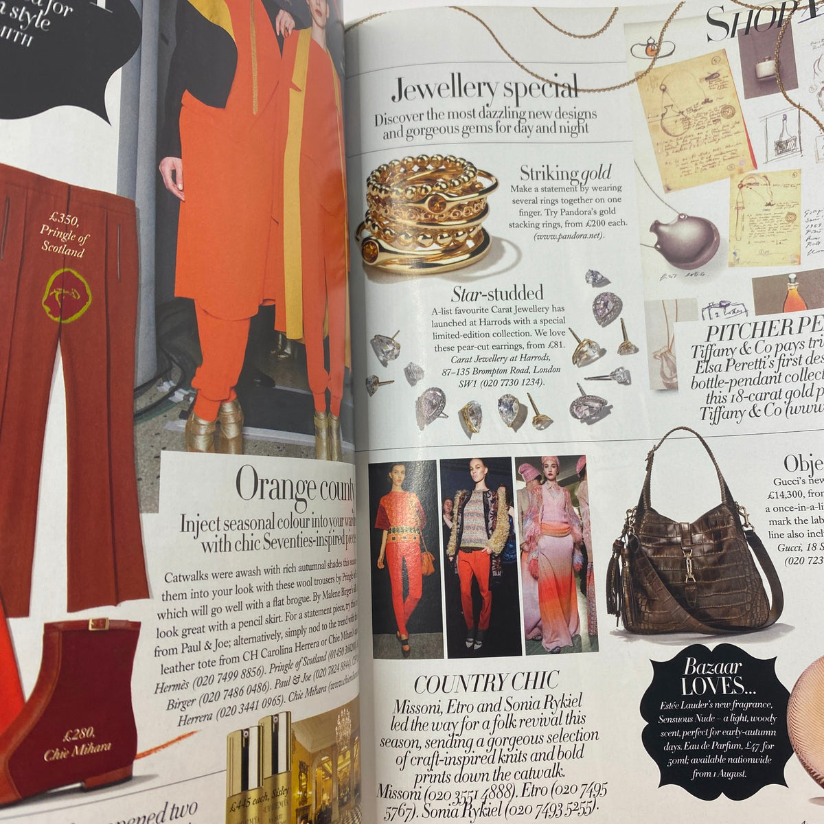 Inside page of Harper's Bazaar UK Magazine August 2011 showcasing a jewellery special with striking gold accessories, reflecting seasonal style trends.