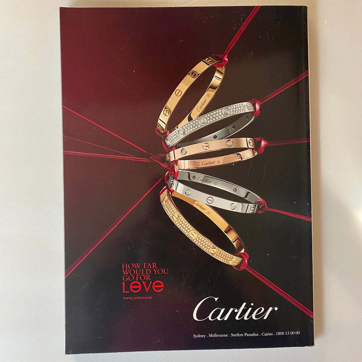 Back cover of Harper's Bazaar Australia Magazine October 2011 featuring a Cartier advertisement, highlighting luxury jewelry.