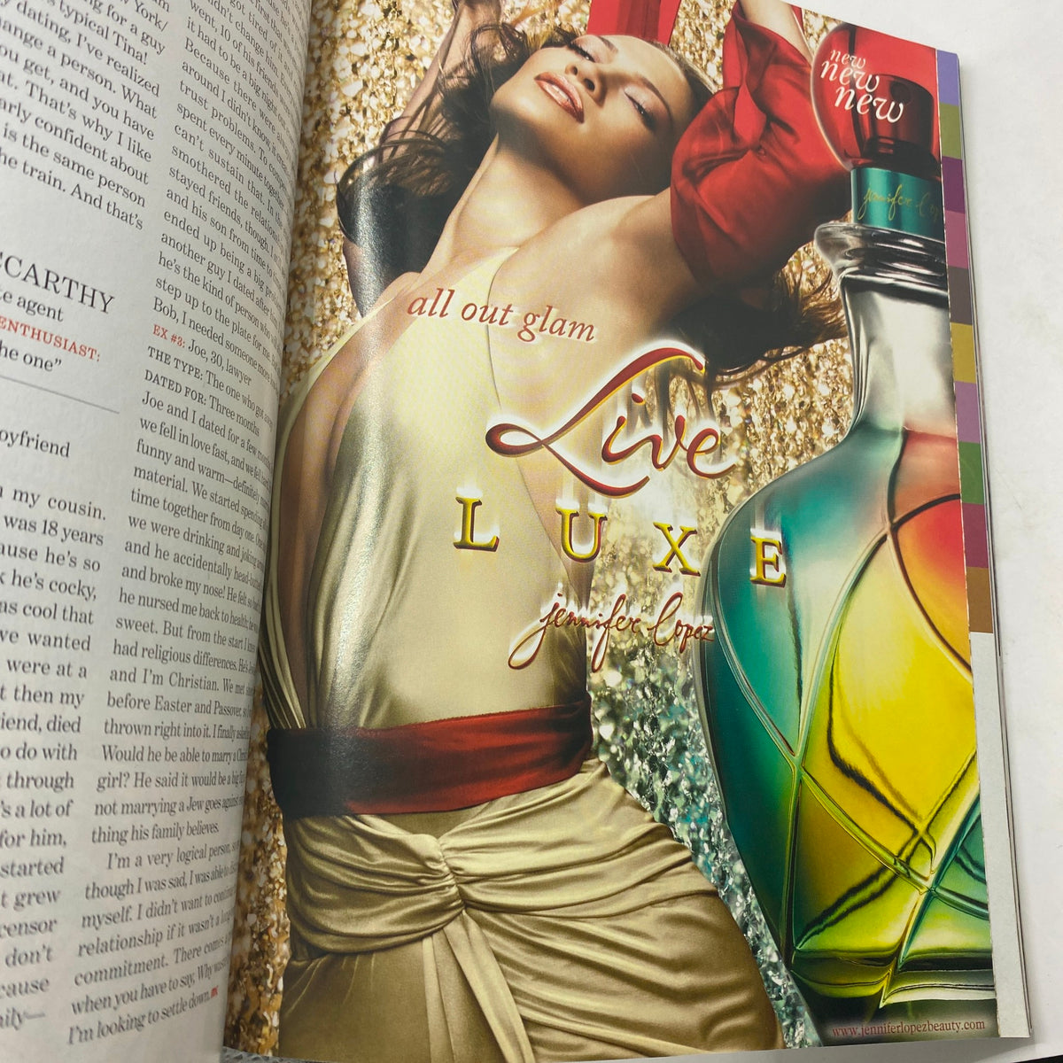 Advertisment spread within the Marie Claire September 2006 magazine promoting Live Luxe fragrance, emphasizing glamorous style.