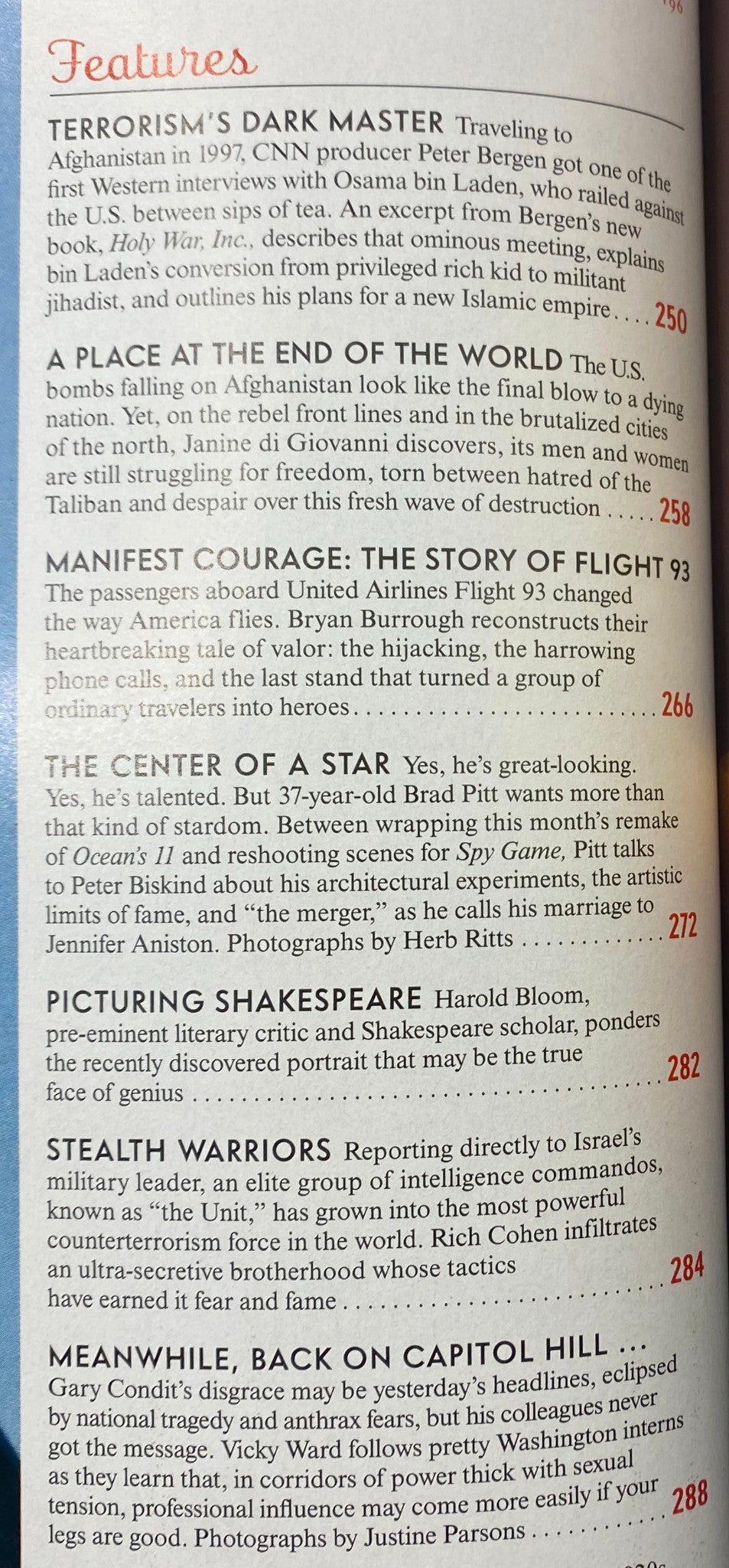 Features page from Vanity Fair Magazine December 2001 including articles on terrorism, courage, and notable events from the time.