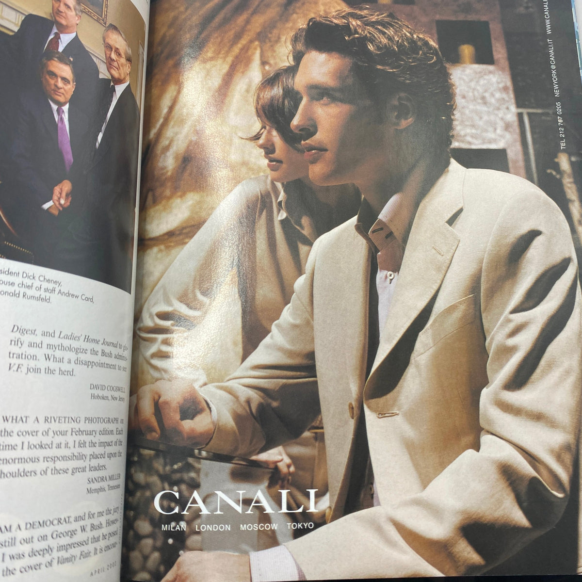 Interior image from Vanity Fair Magazine April 2002 showcasing a fashion spread for Canali, featuring a well-dressed male model, representing style and elegance in early 2000s fashion.