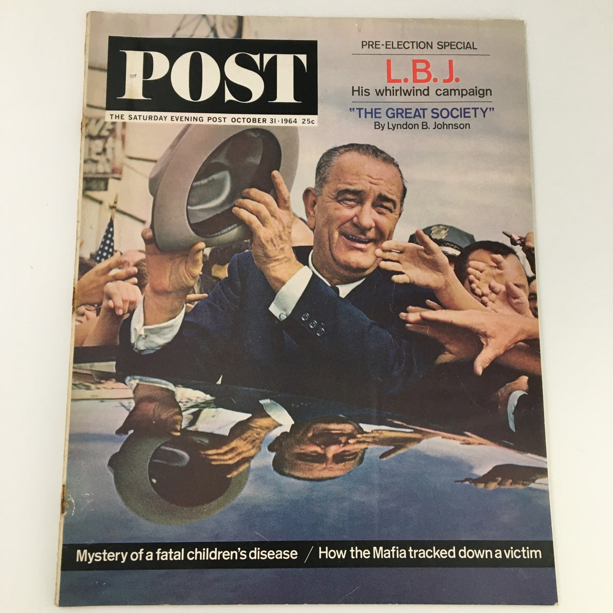 Cover of The Saturday Evening Post from October 31, 1964, featuring Lyndon B. Johnson and a bustling campaign scene. This magazine captures a historic moment in American politics.