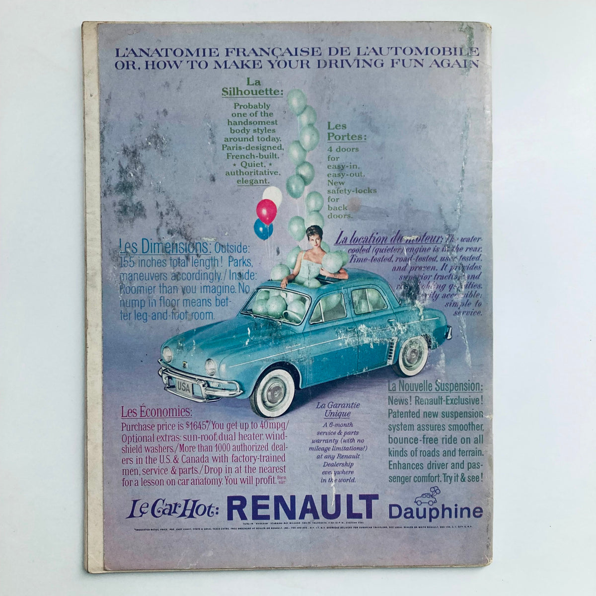 Back cover of the VTG Playboy Magazine July 1960, highlighting an advertisement for Renault Dauphine with a model on top of the car and colorful balloons, embodying mid-century automotive marketing.