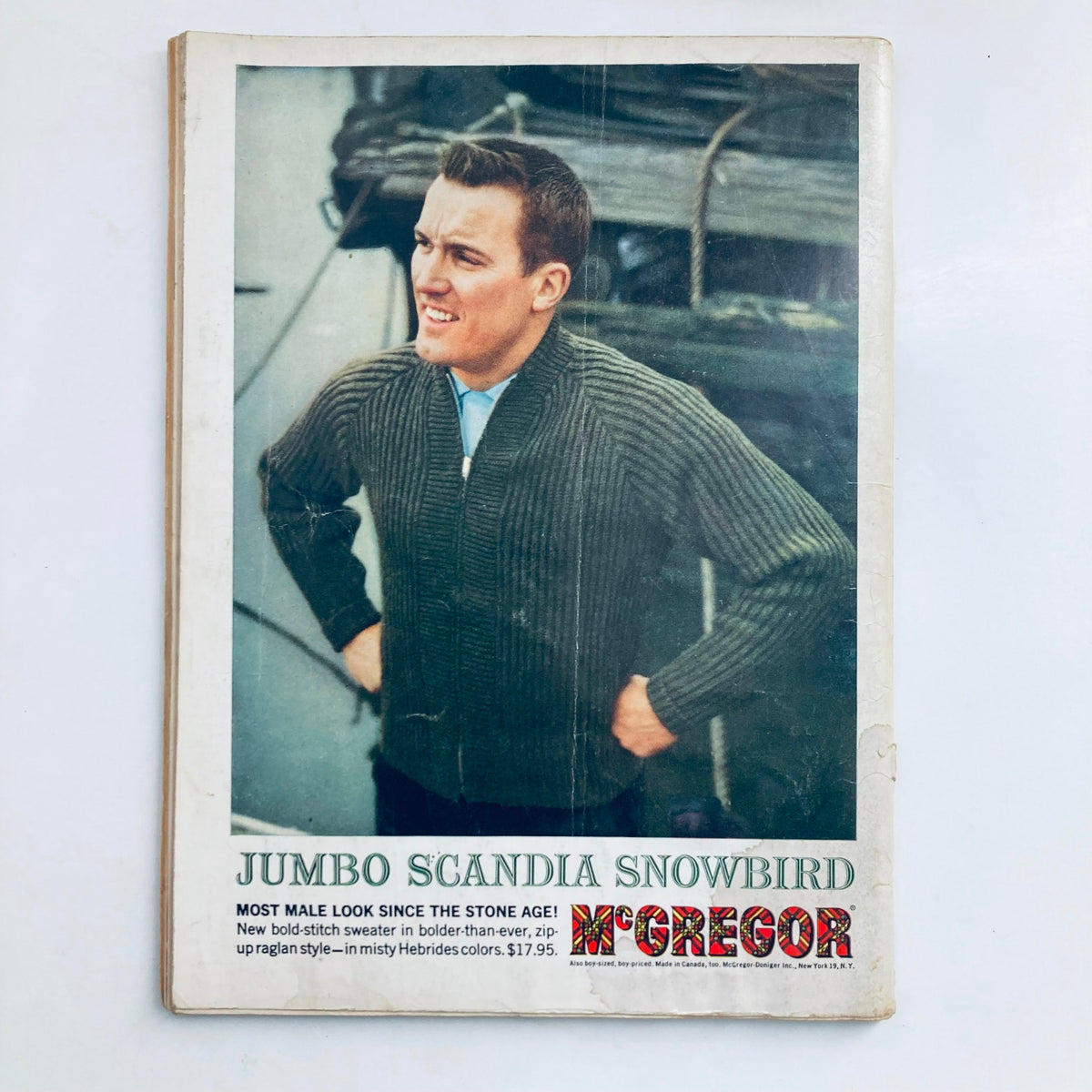 Advertisement from VTG Playboy Magazine October 1960 showcasing fashion, featuring a model in knitwear.