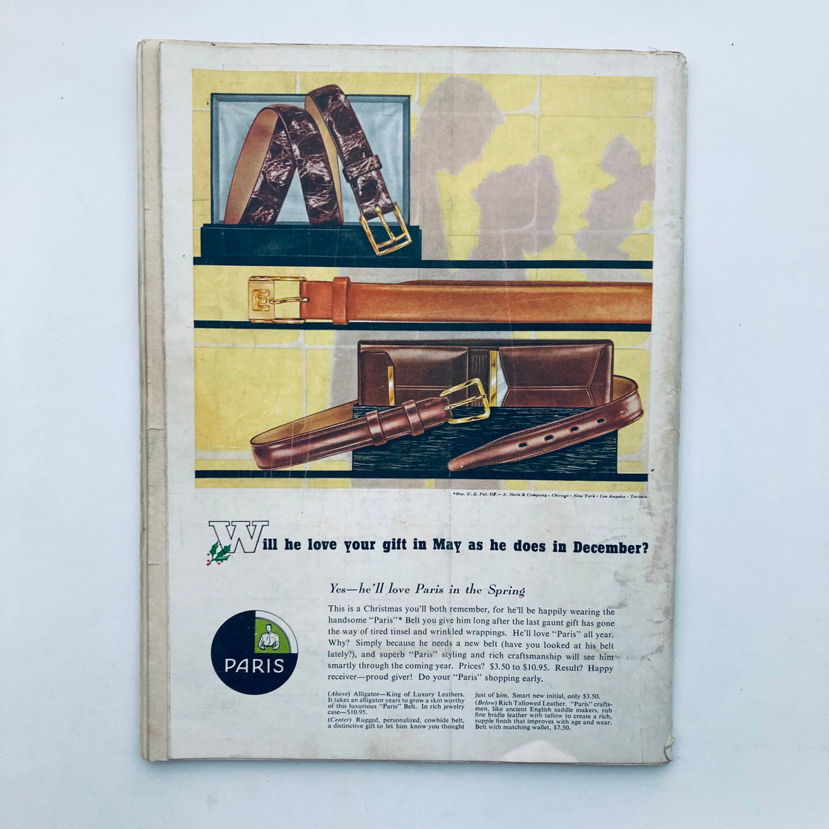 Back cover of VTG Playboy Magazine December 1958, showcasing an advertisement for stylish leather belts and accessories. Demonstrates the vintage advertising style of the late 1950s.