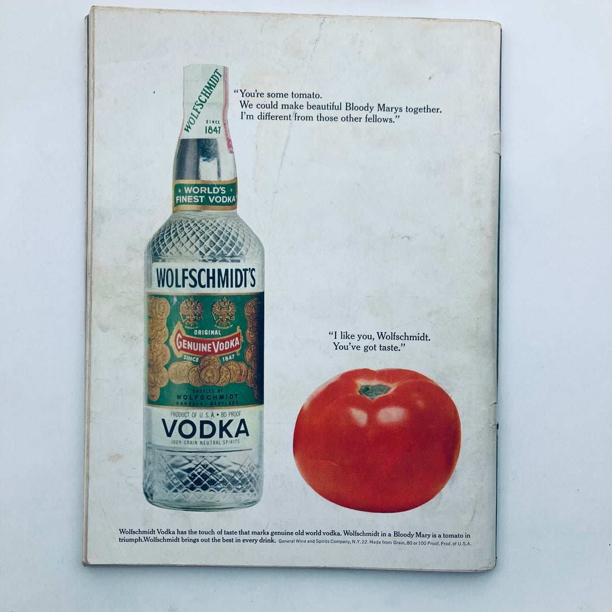 Back cover of VTG Playboy Magazine November 1961 showcasing a vintage advertisement for Wolfschmidts vodka and a tomato.