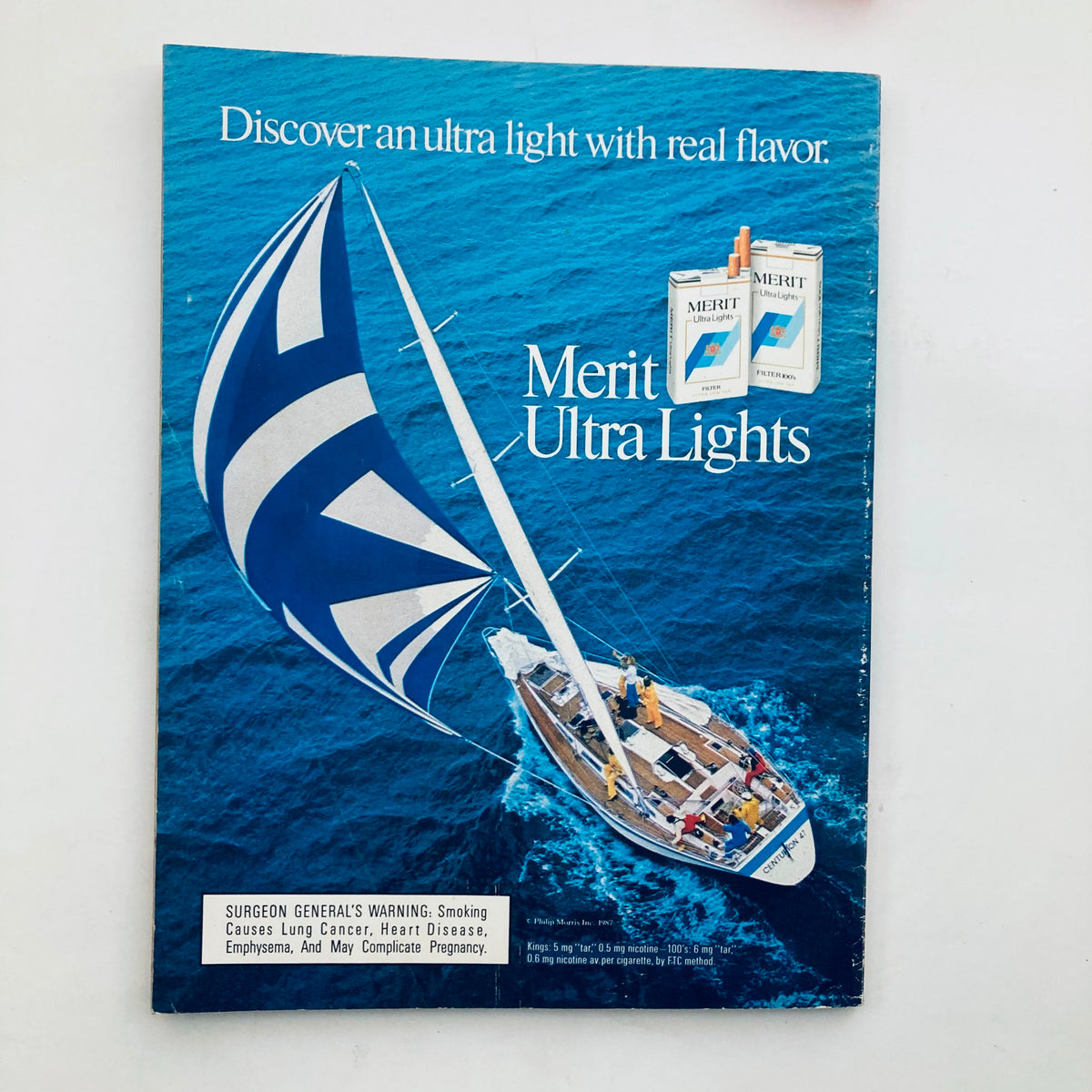 Back cover of VTG Playboy Magazine November 1987 promoting Merit Ultra Lights cigarettes, reflecting vintage advertising styles.