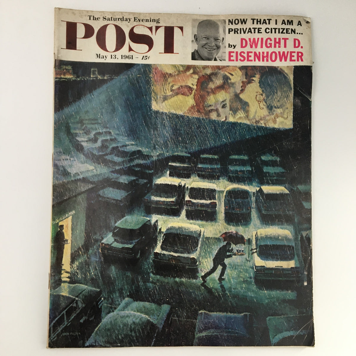 The Saturday Evening Post May 13 1961 cover featuring artwork of a rainy night with cars and a person with an umbrella, highlighting an article by Dwight D. Eisenhower.
