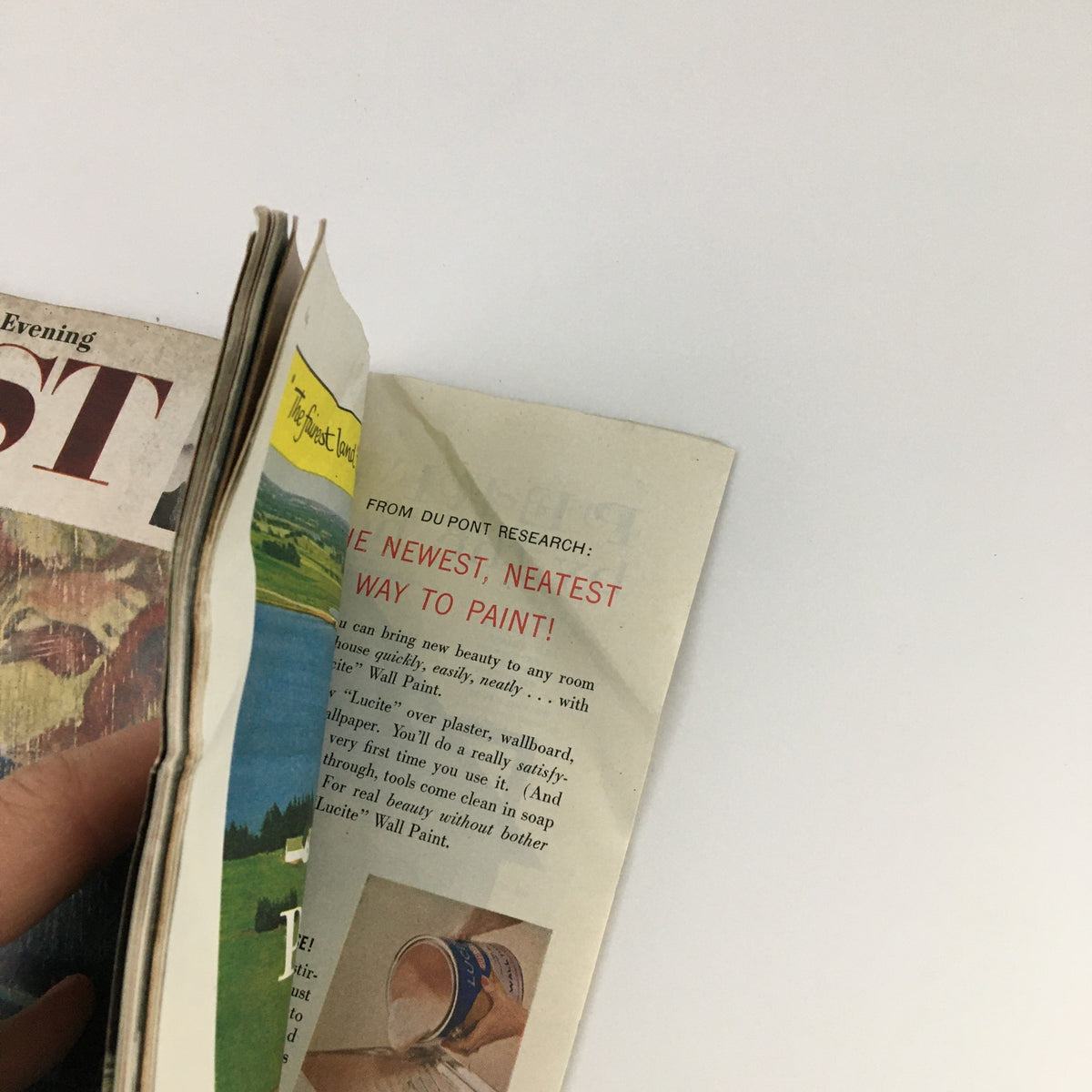 Interior view of The Saturday Evening Post May 13 1961 showing the publication's pages, including an advertisement for 'Lucite' wall paint.