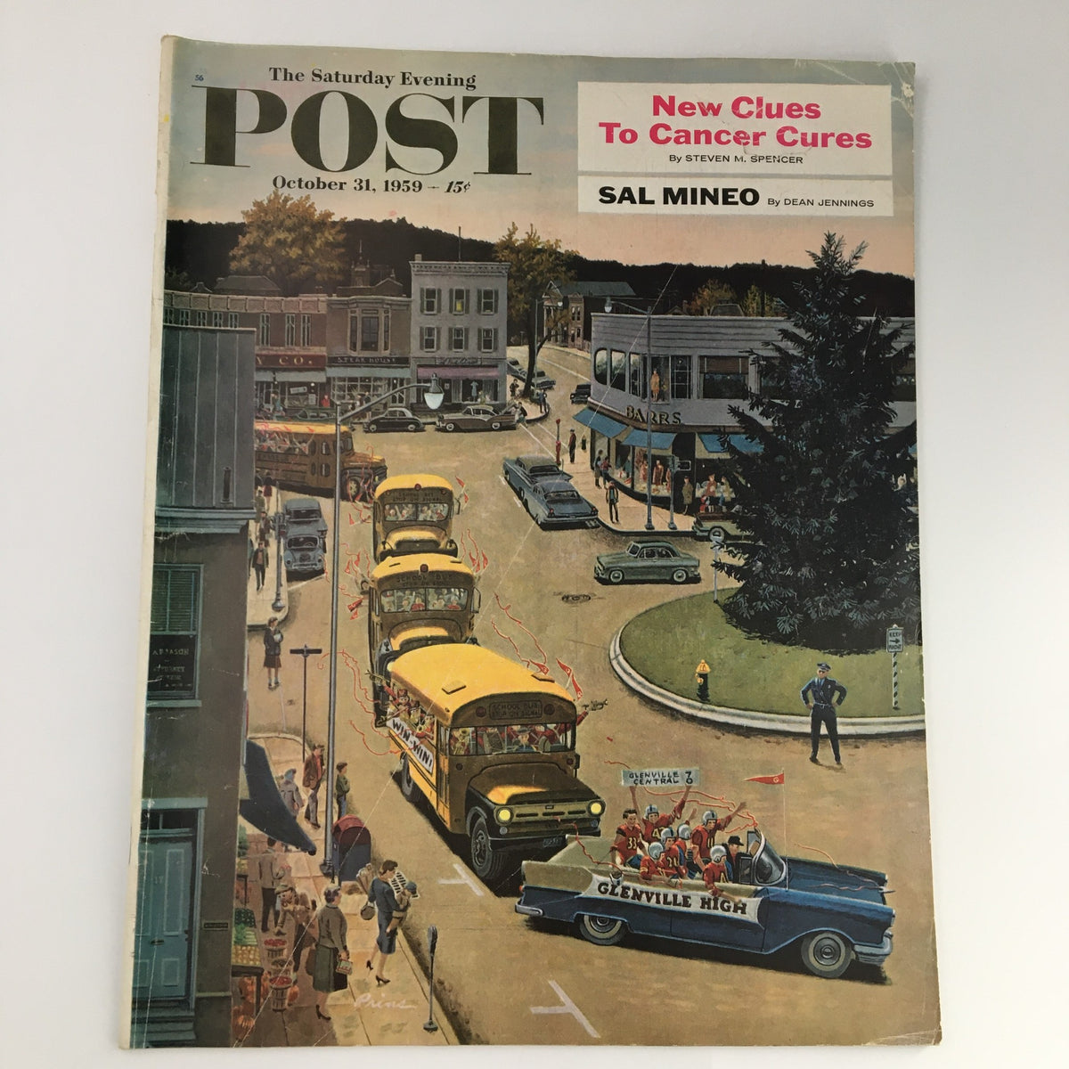 The Saturday Evening Post October 31 1959 cover featuring a vibrant illustration of a town parade with school buses and attendees, highlighting Sal Mineo as the featured actor.