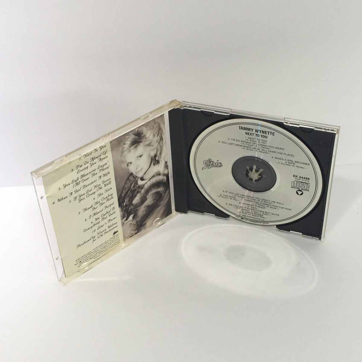 Opened Tammy Wynette Next To You Audio CD showing the disc and inside cover with tracklist.