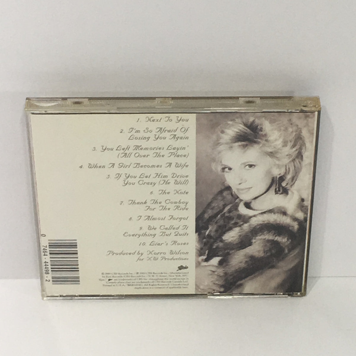 Back cover of Tammy Wynette Next To You Audio CD highlighting the tracklist and artist photo.